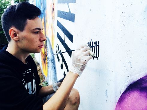 Автор граффити. Фото предоставлено Сергеем Нурутдиновым